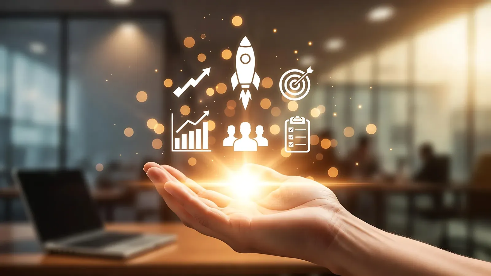 An open hand below icons for growth, targets and launch